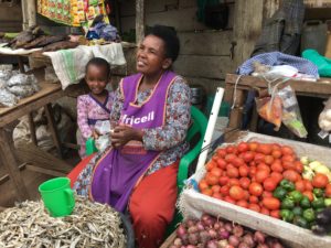 Woman business owner and child